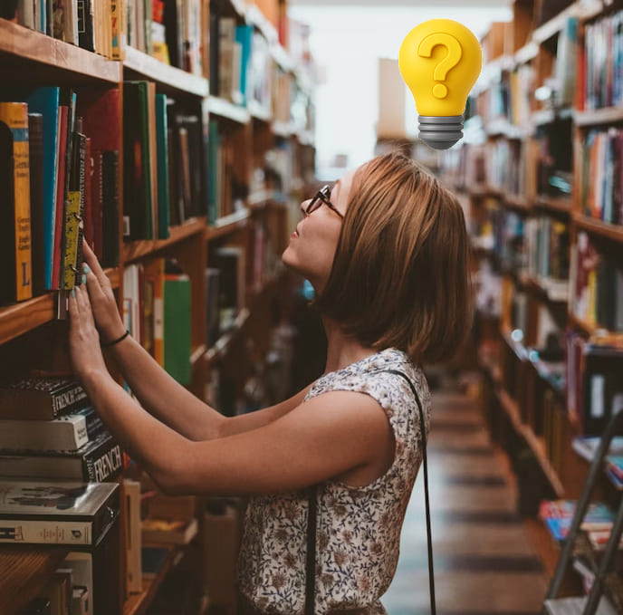 student in library