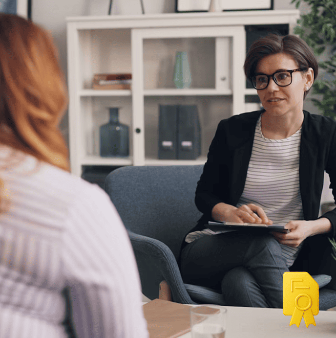 women in interview with IQ test result