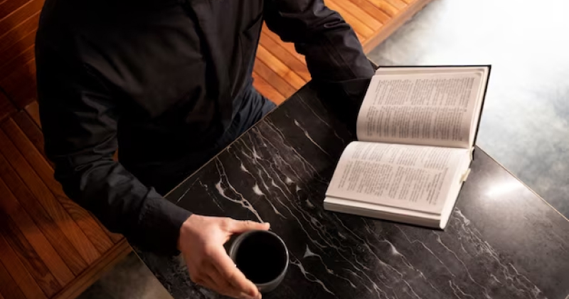 a person reading a holy book